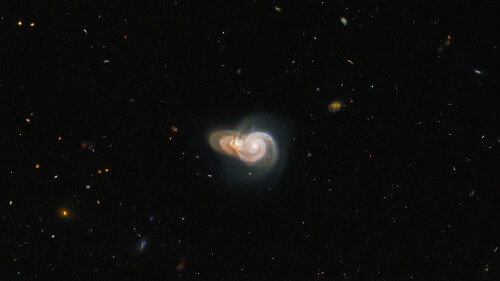 Hubble-Sees-Two-Overlapping-Galaxies.jpg